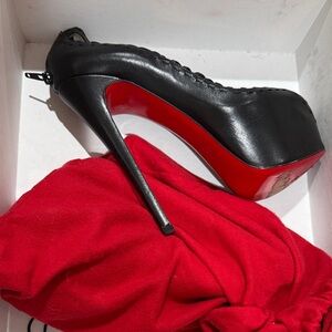 Christian Louboutin Black Stiletto with Red Sole
